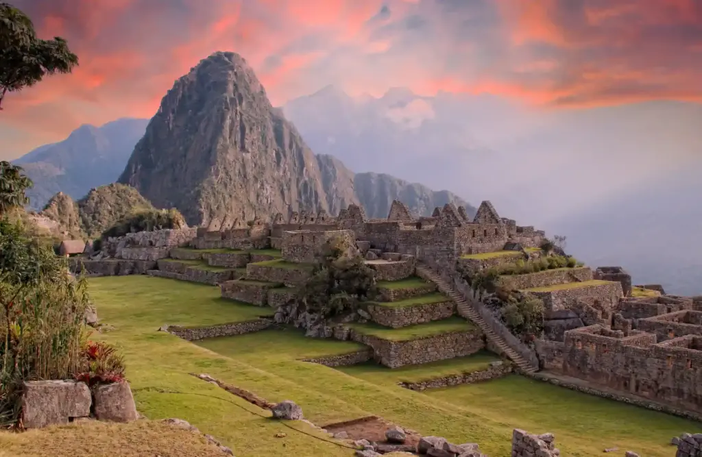 Clouds turned red around Machu Picchu's summit as the night enters